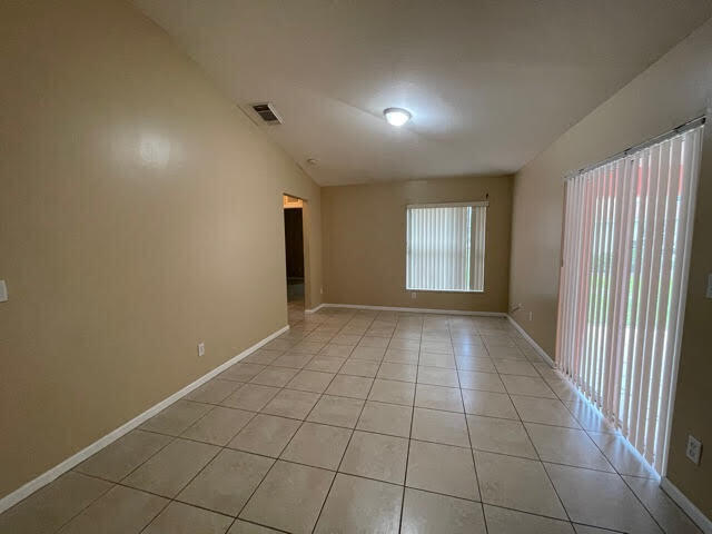 2675 Southwest Ann Arbor Road Port St. Lucie, FL 34953 - Photo 9 of 27 living room 1
