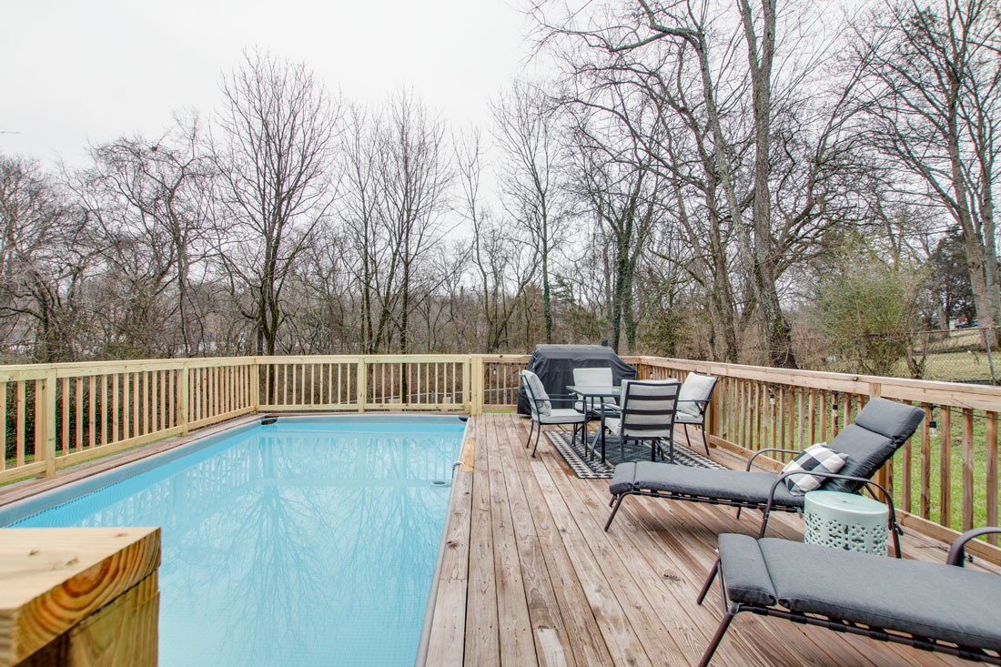 121 Jacksonian Drive Hermitage, TN 37076 - Photo 25 of 28 a view of a chair and fire pit in the roof deck