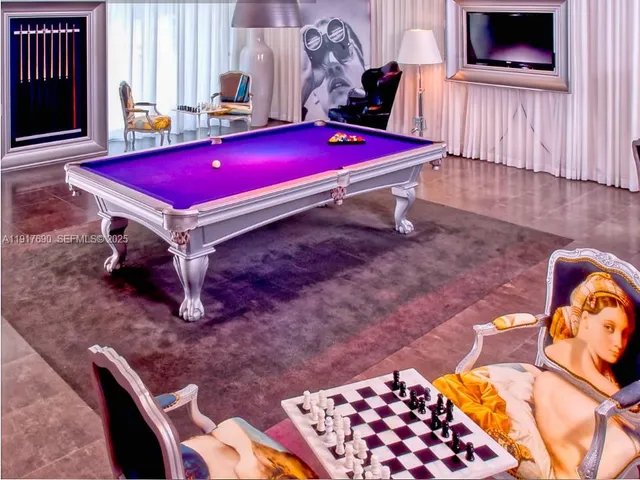 a view of a living room with entryway