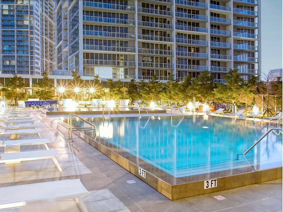 475 Brickell Avenue, Unit 1615 Miami, FL 33131 - Photo 16 of 19 a view of a swimming pool
