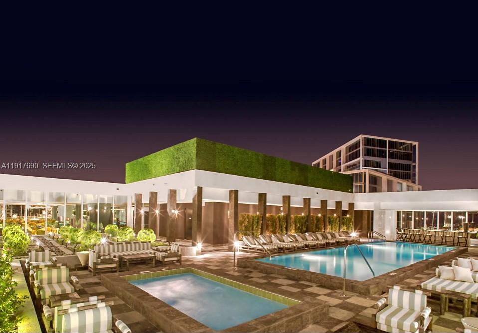 475 Brickell Avenue, Unit 1615 Miami, FL 33131 - Photo 17 of 19 a view of a swimming pool with a patio