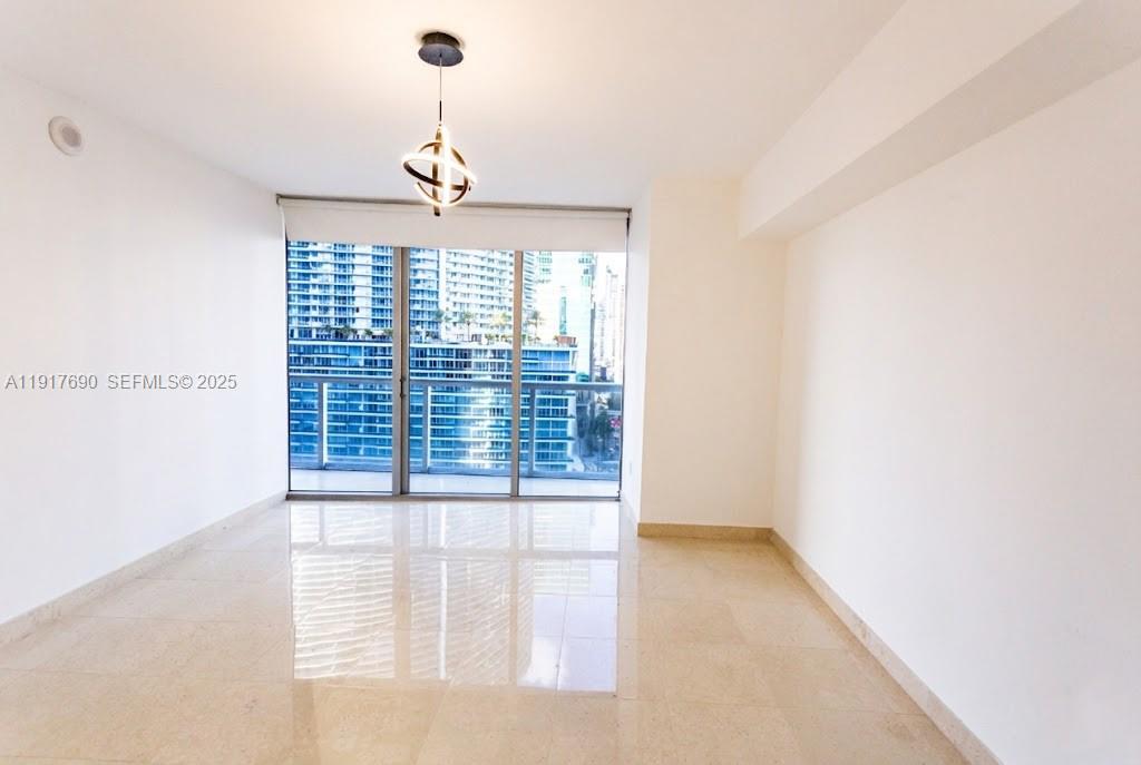 475 Brickell Avenue, Unit 1615 Miami, FL 33131 - Photo 6 of 19 a view of an empty room with a window