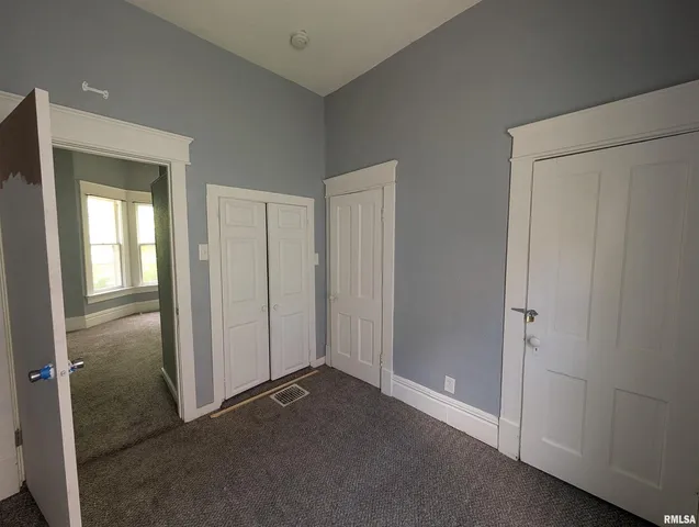 an empty room with closet