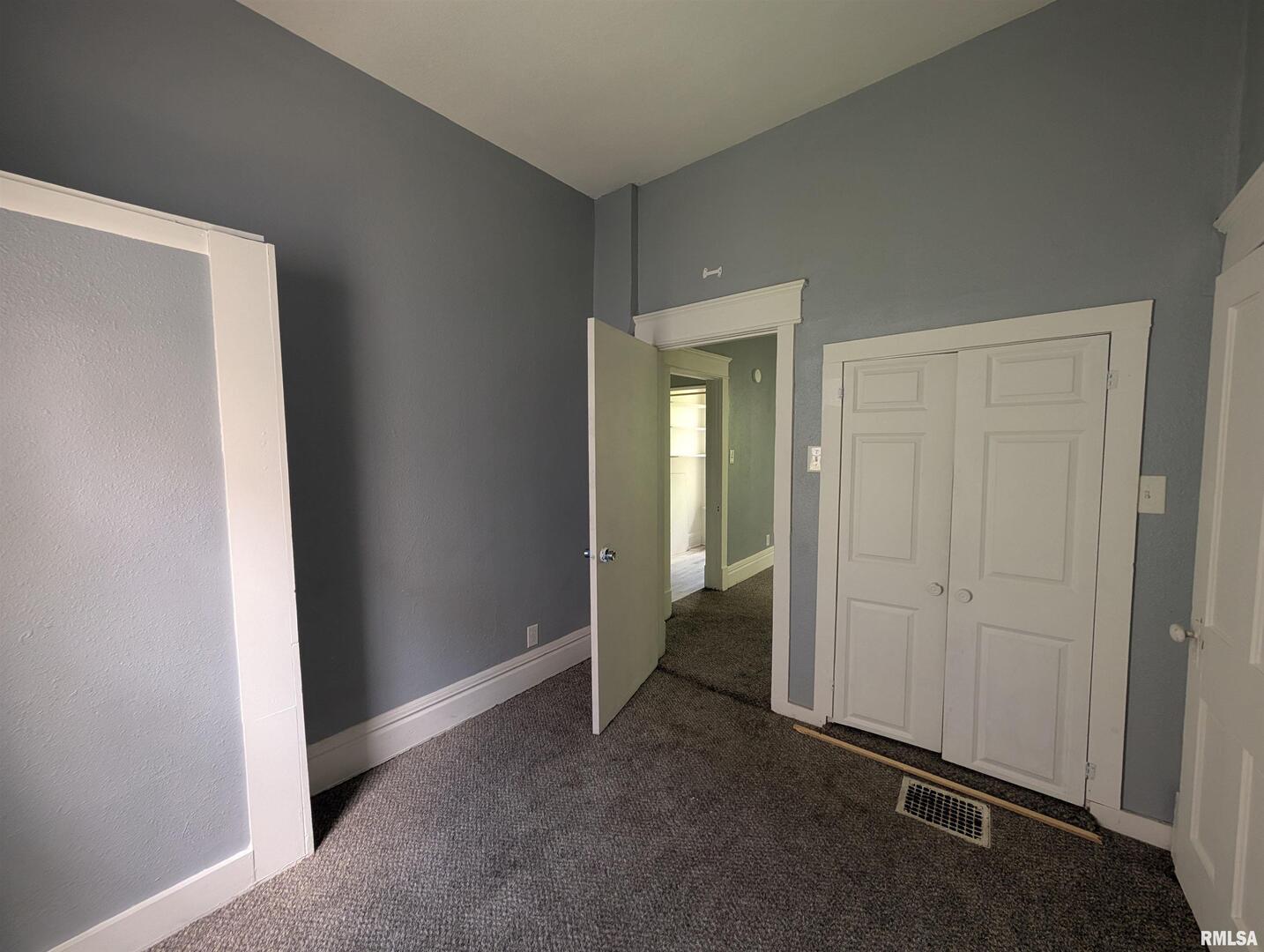 2833 8th Avenue Rock Island, IL 61201 - Photo 12 of 21 an empty room with closet
