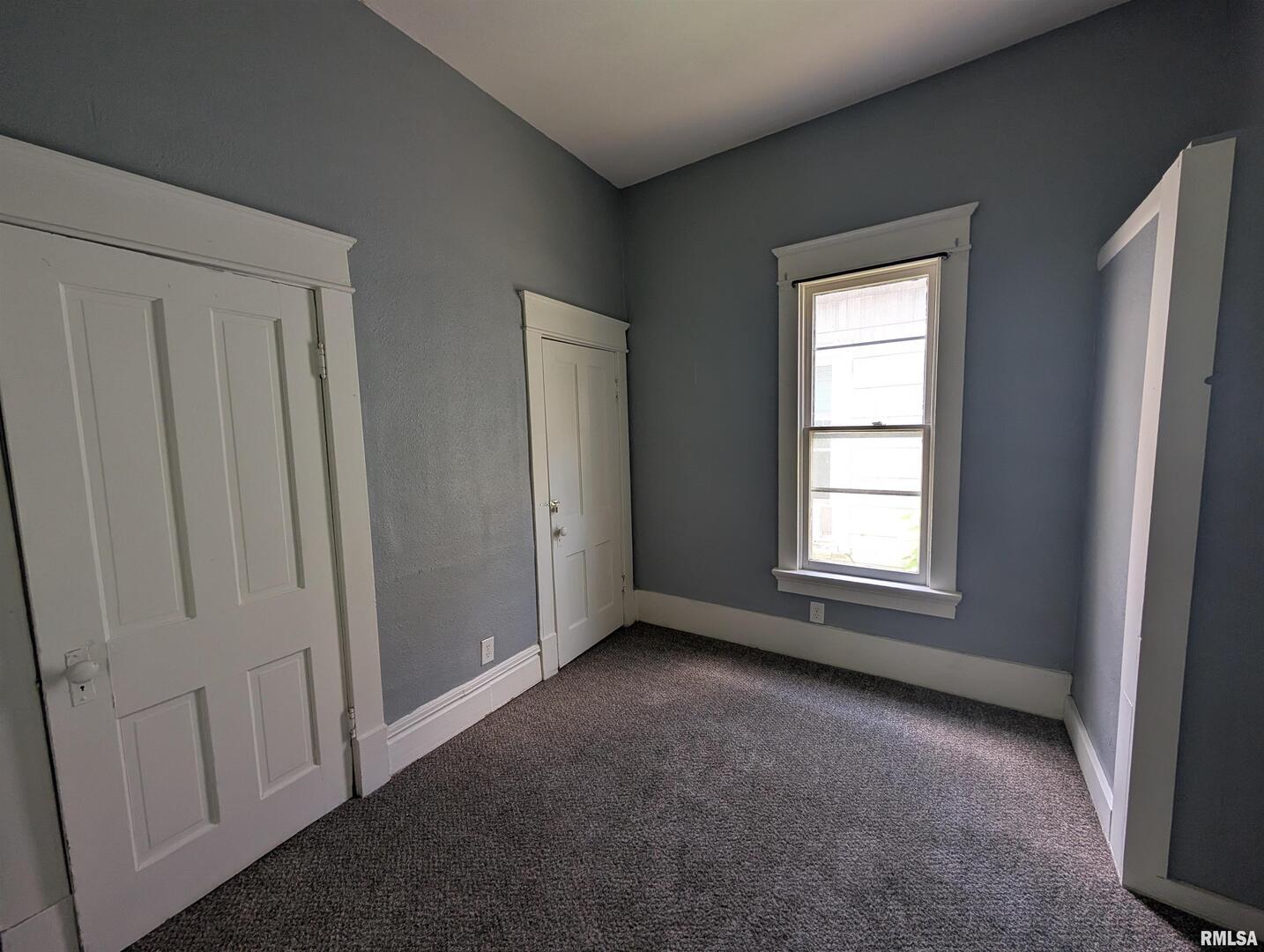 2833 8th Avenue Rock Island, IL 61201 - Photo 13 of 21 an empty room with windows