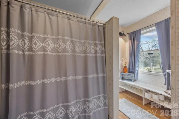 a utility room with multiple dryer and washer
