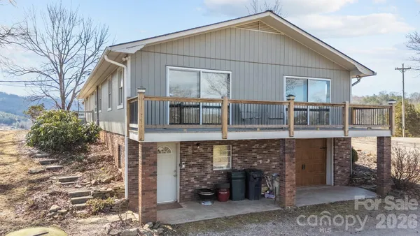 a front view of a house with a balcony