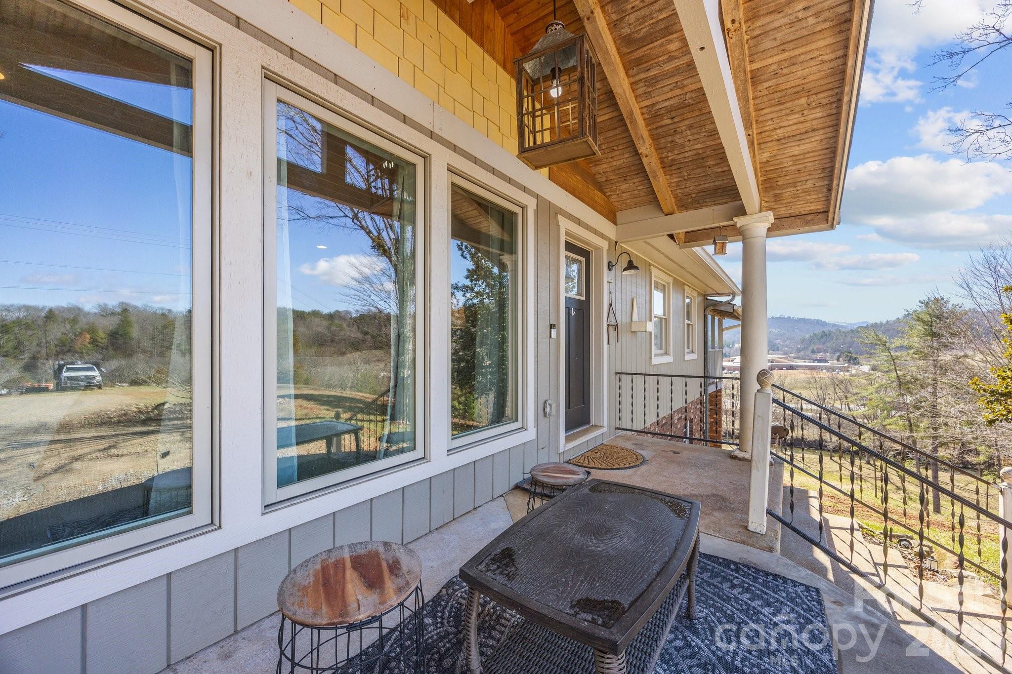 774 Belleview Road Franklin, NC 28734 - Photo 35 of 36 a balcony view with a seating space