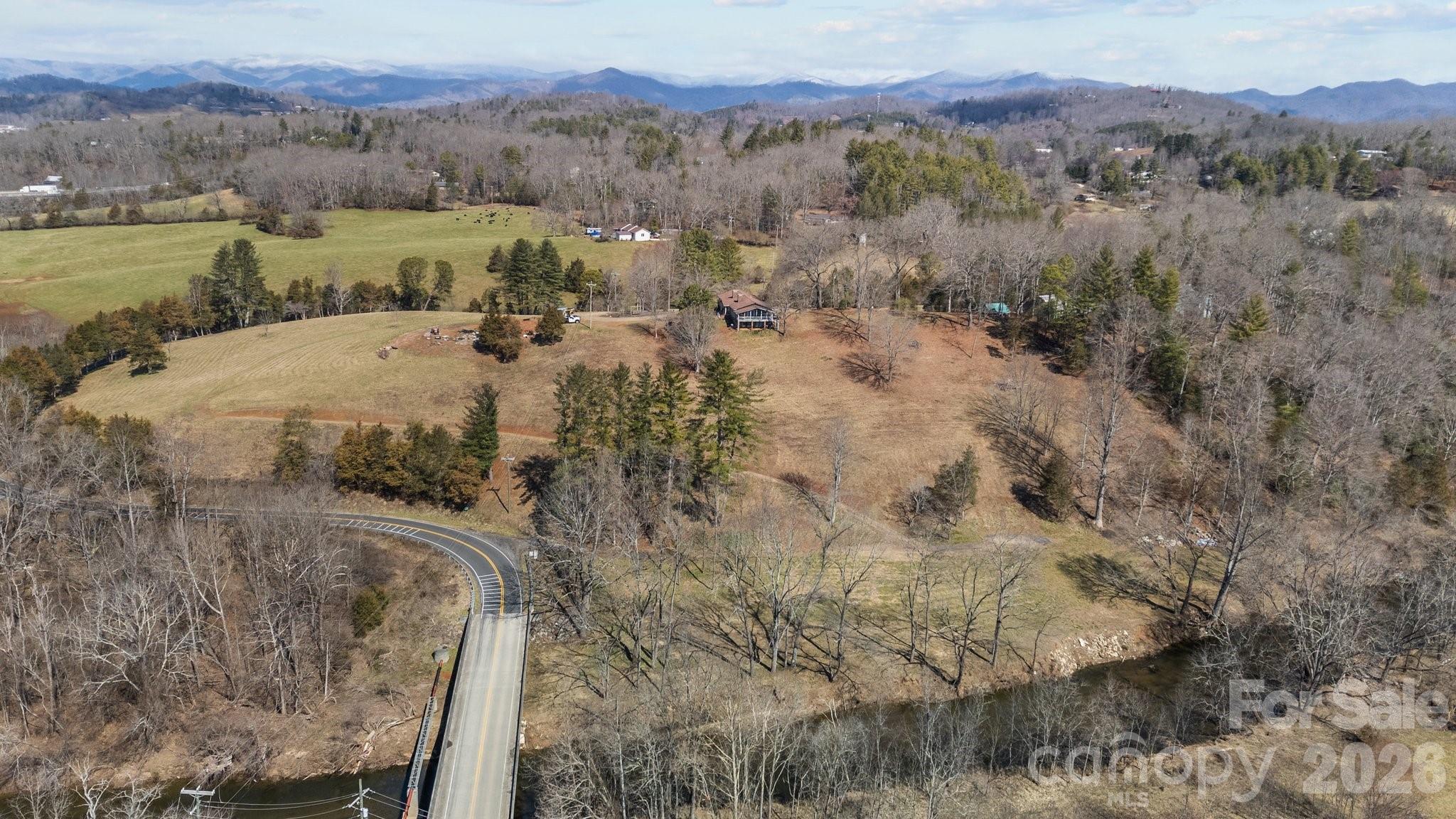 774 Belleview Road Franklin, NC 28734 - Photo 5 of 36 a view of lake with mountain