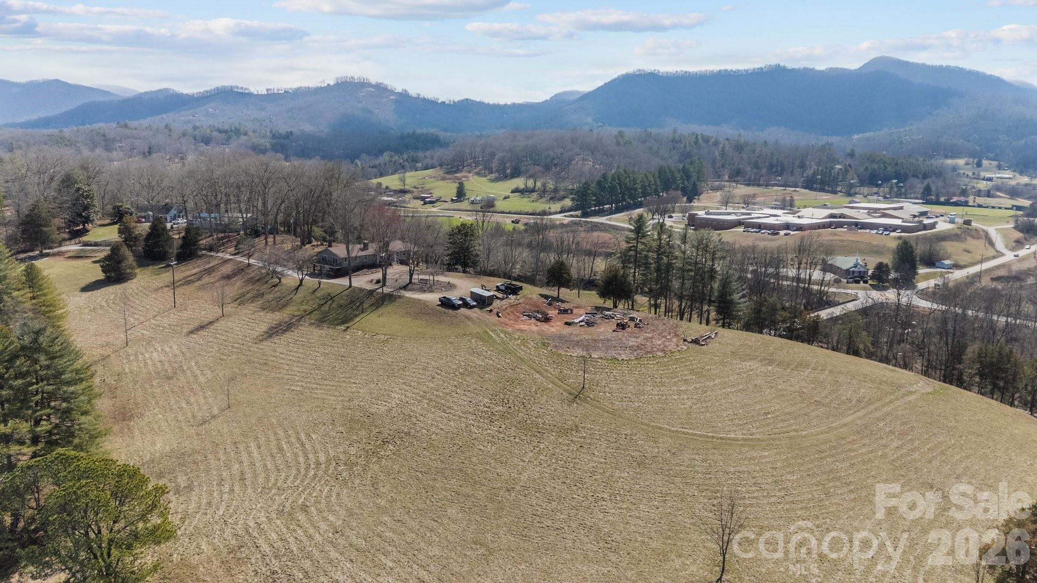 774 Belleview Road Franklin, NC 28734 - Photo 7 of 36 a view of a town with mountains in the background
