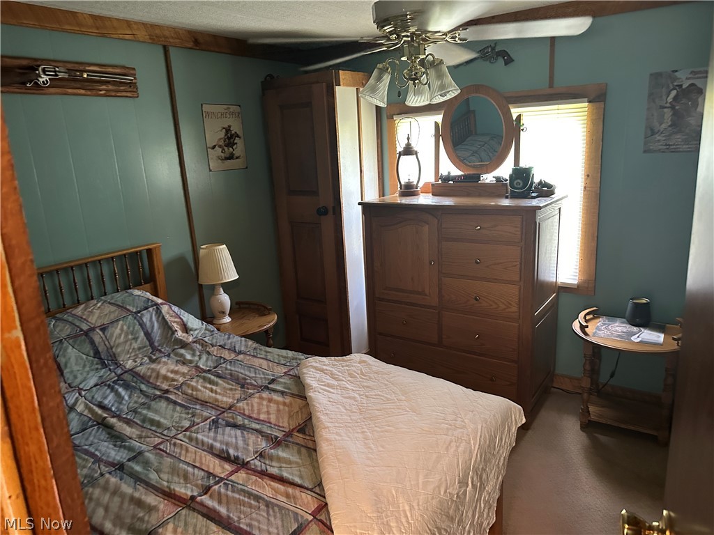 4041 Gray Road Kimbolton, OH 43749 - Photo 23 of 32 Bedroom featuring ceiling fan and a textured ceiling