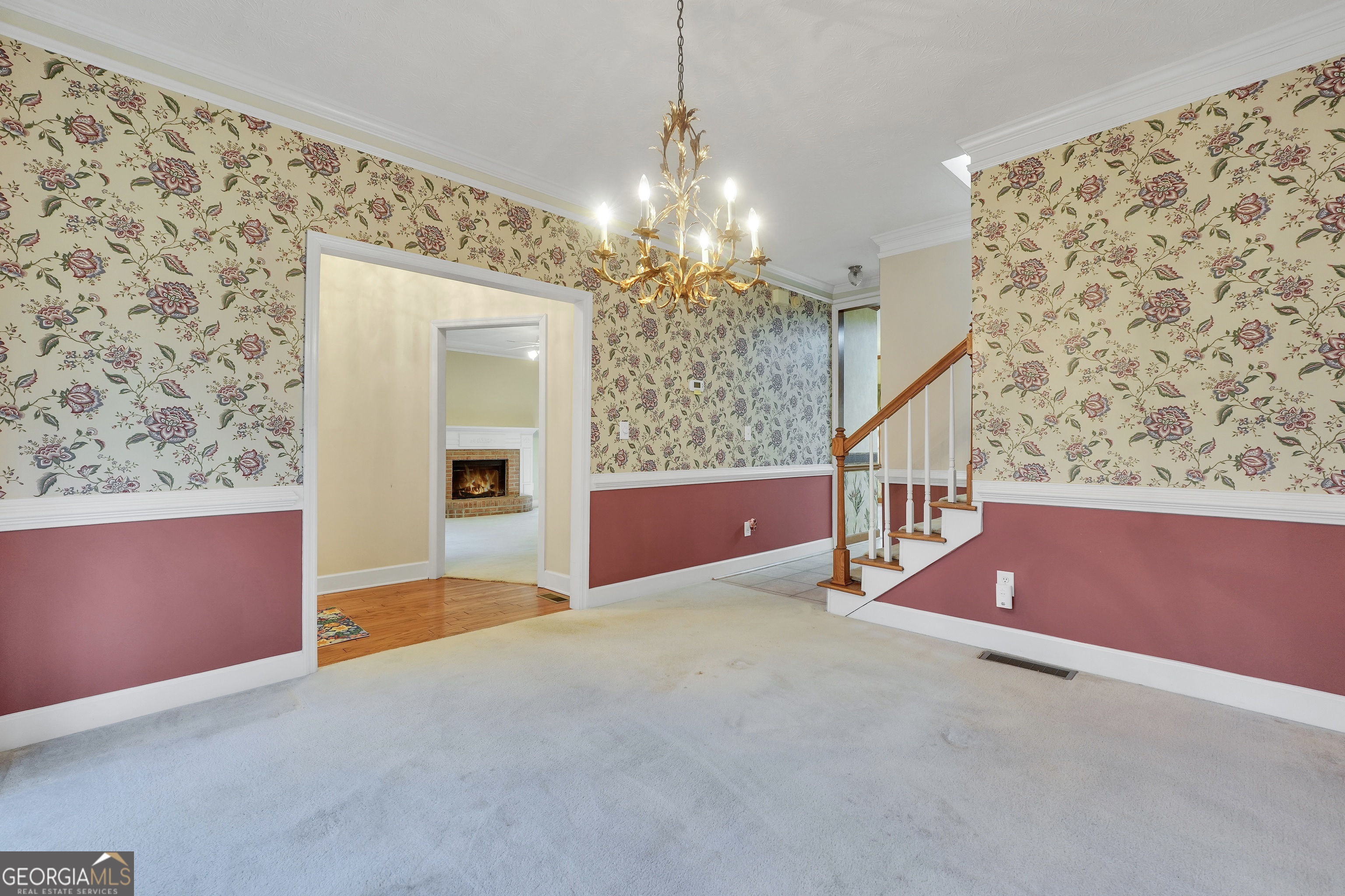 2141 South River Road Southwest Conyers, GA 30094 - Photo 15 of 54 en empty room with windows and chandelier