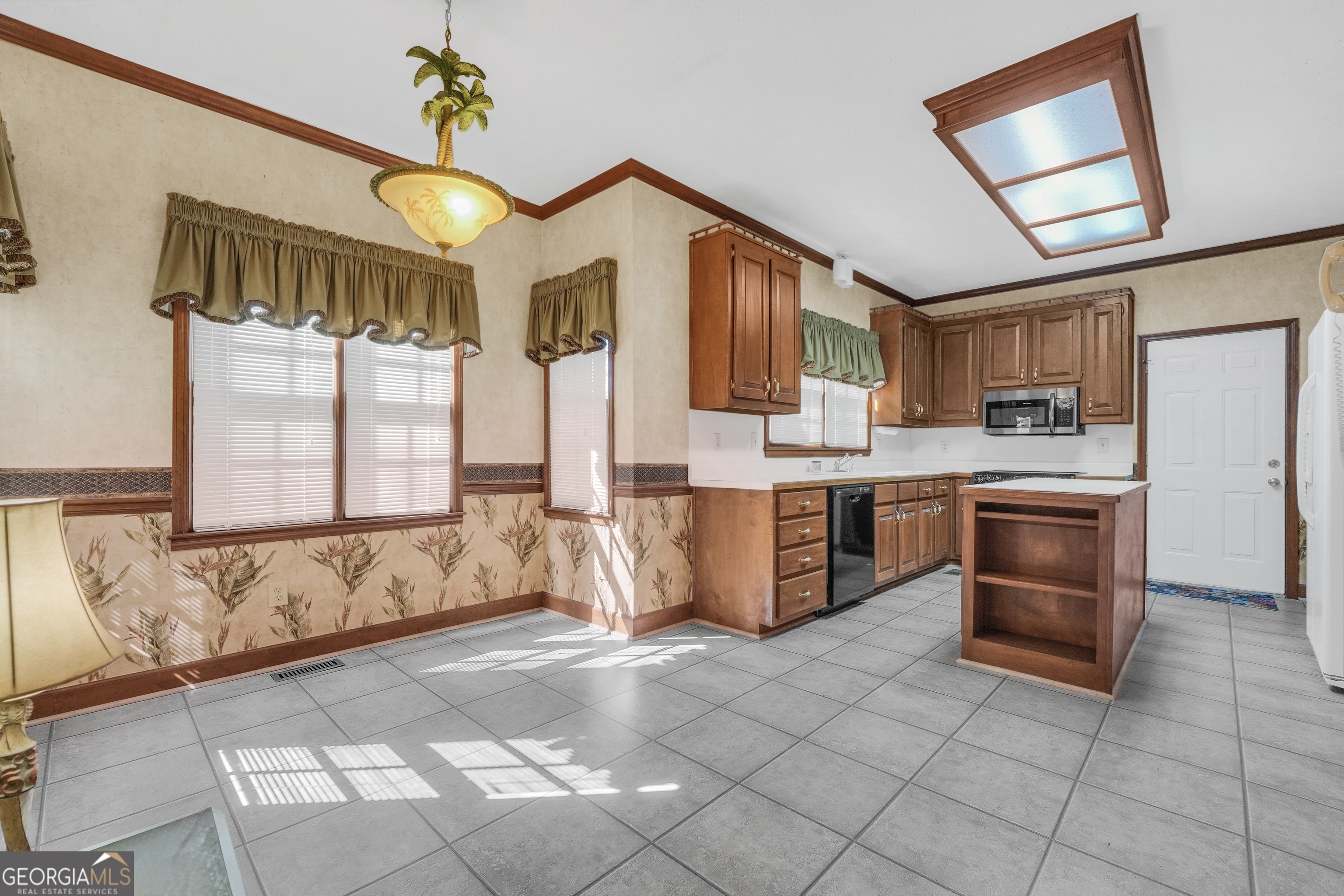 2141 South River Road Southwest Conyers, GA 30094 - Photo 19 of 54 a kitchen with stainless steel appliances granite countertop a stove a sink and a refrigerator