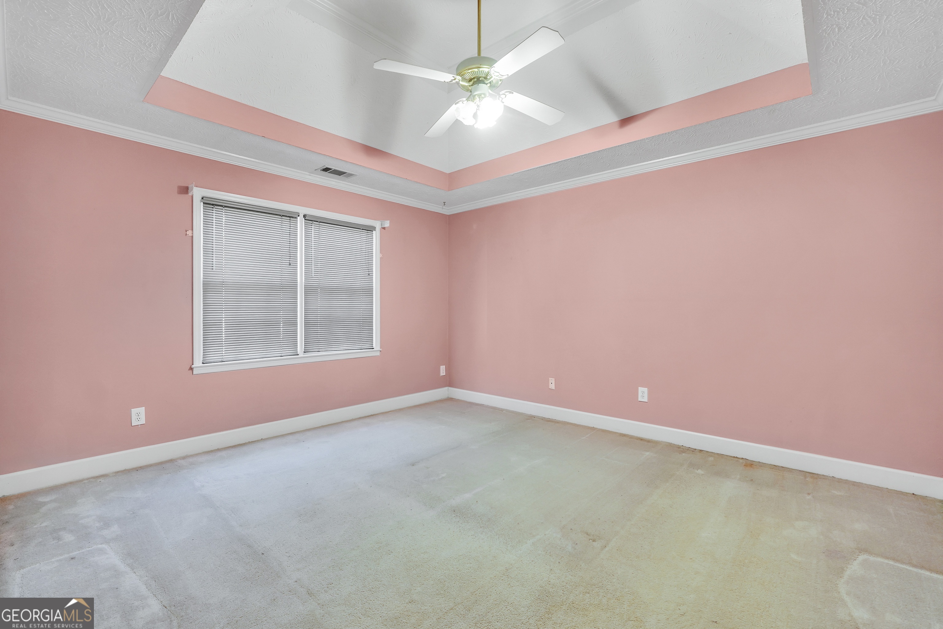 2141 South River Road Southwest Conyers, GA 30094 - Photo 30 of 54 en empty room with windows and ceiling fan