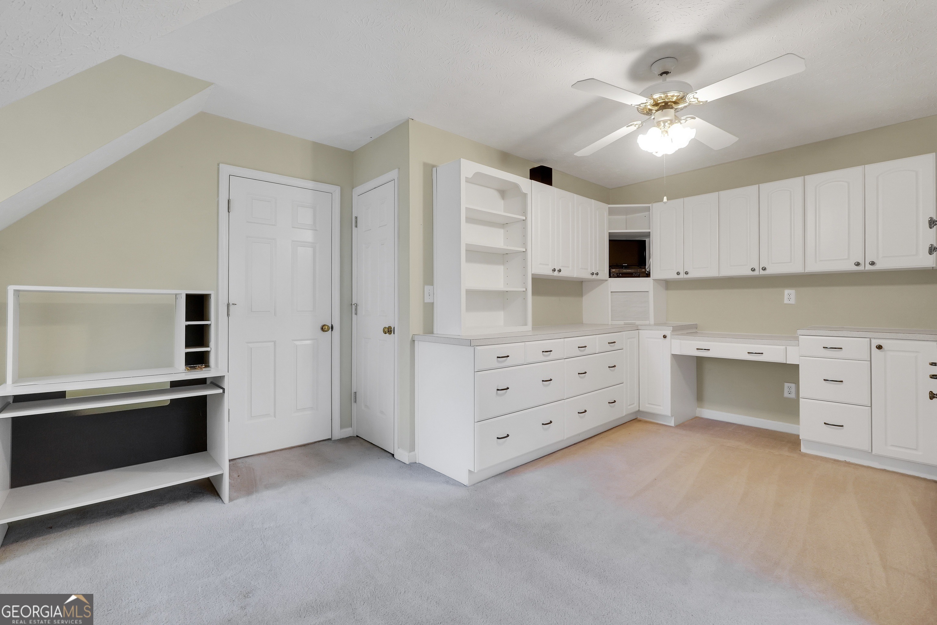 2141 South River Road Southwest Conyers, GA 30094 - Photo 41 of 54 a kitchen with stainless steel appliances a stove a sink and a refrigerator
