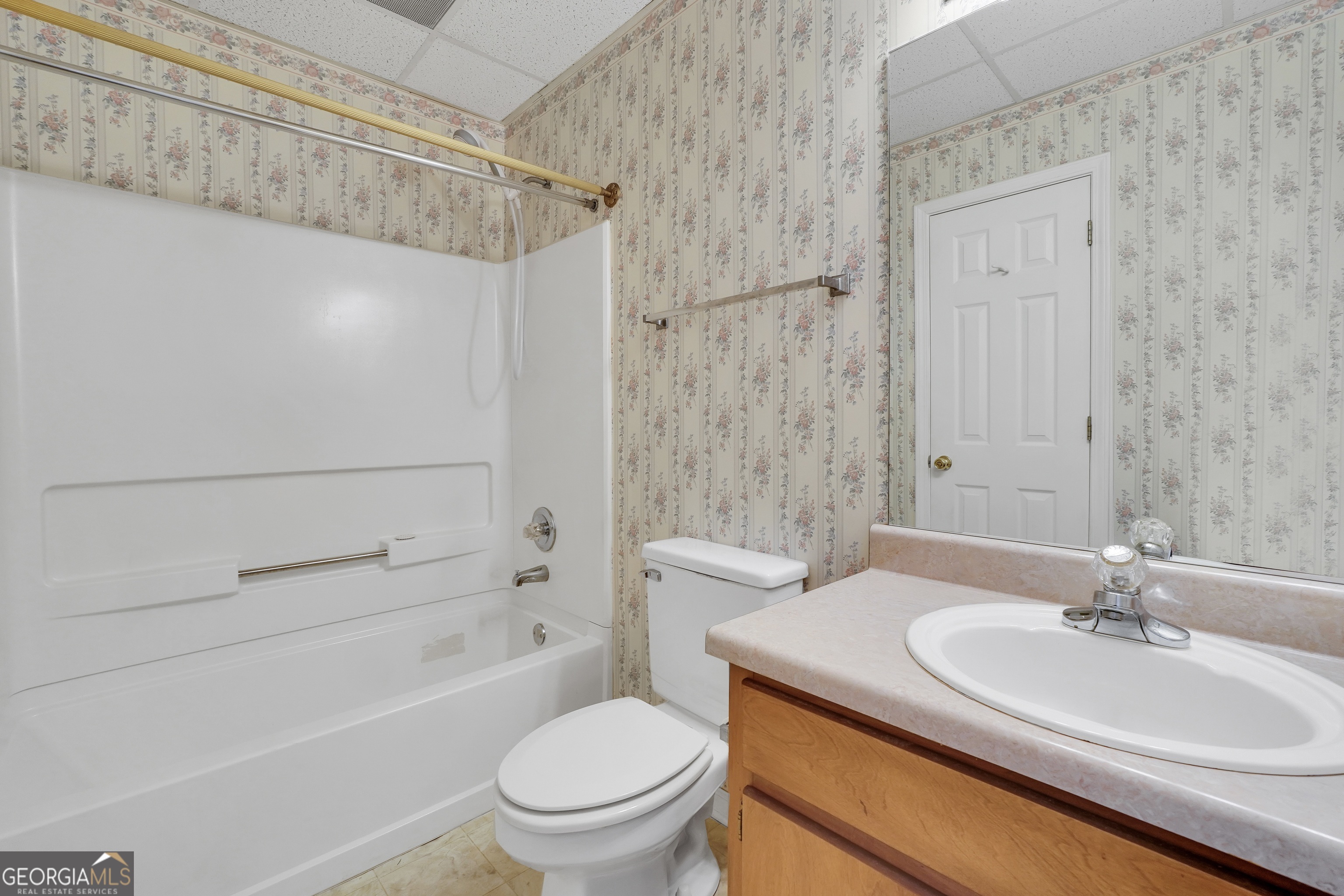 2141 South River Road Southwest Conyers, GA 30094 - Photo 44 of 54 a bathroom with a sink a toilet and shower