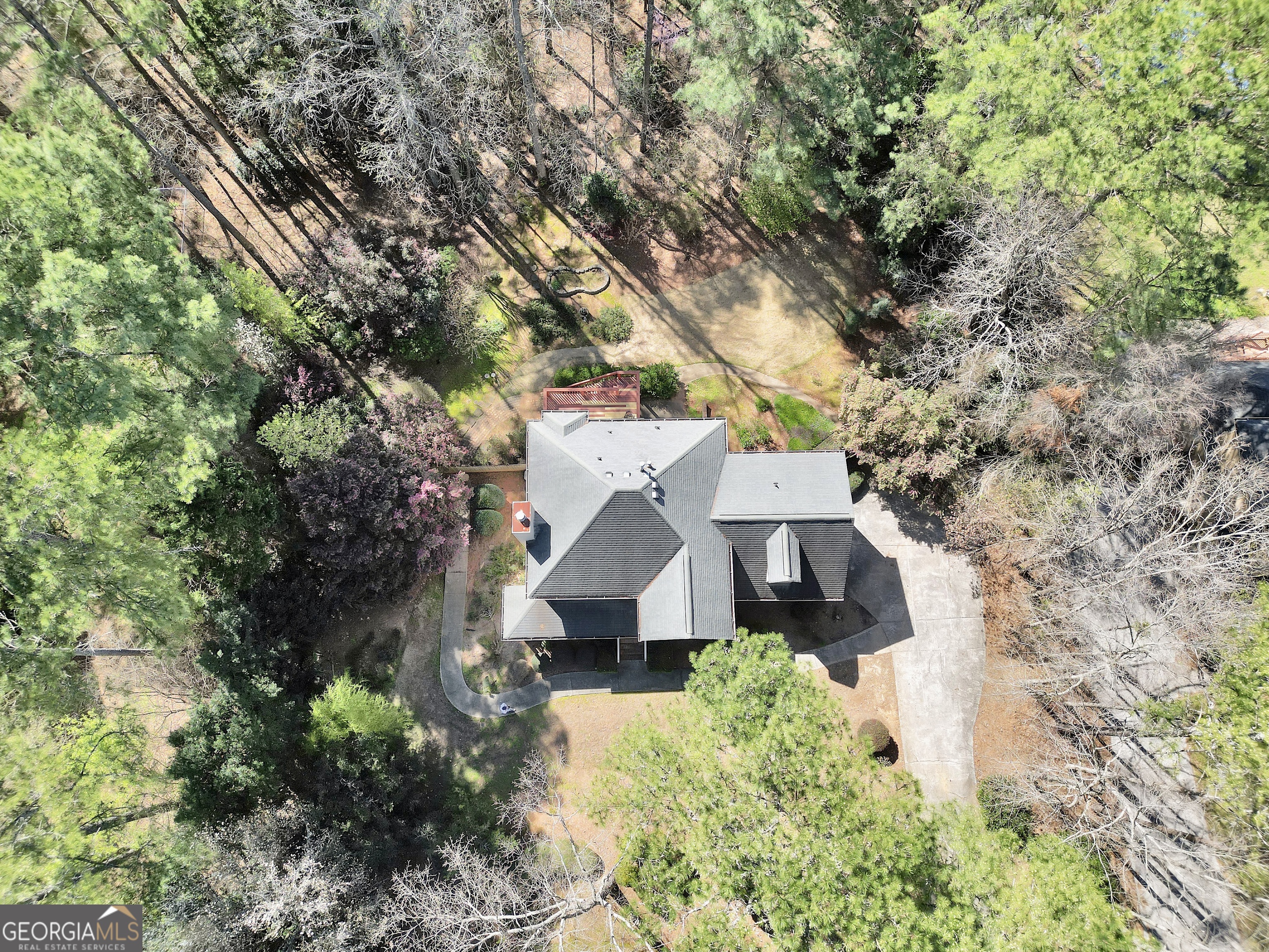 2141 South River Road Southwest Conyers, GA 30094 - Photo 8 of 54 a view of a house with a yard and large tree