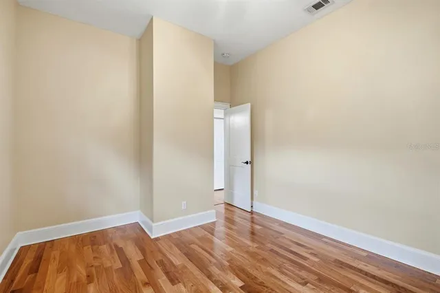 a view of a backyard with a small cabin