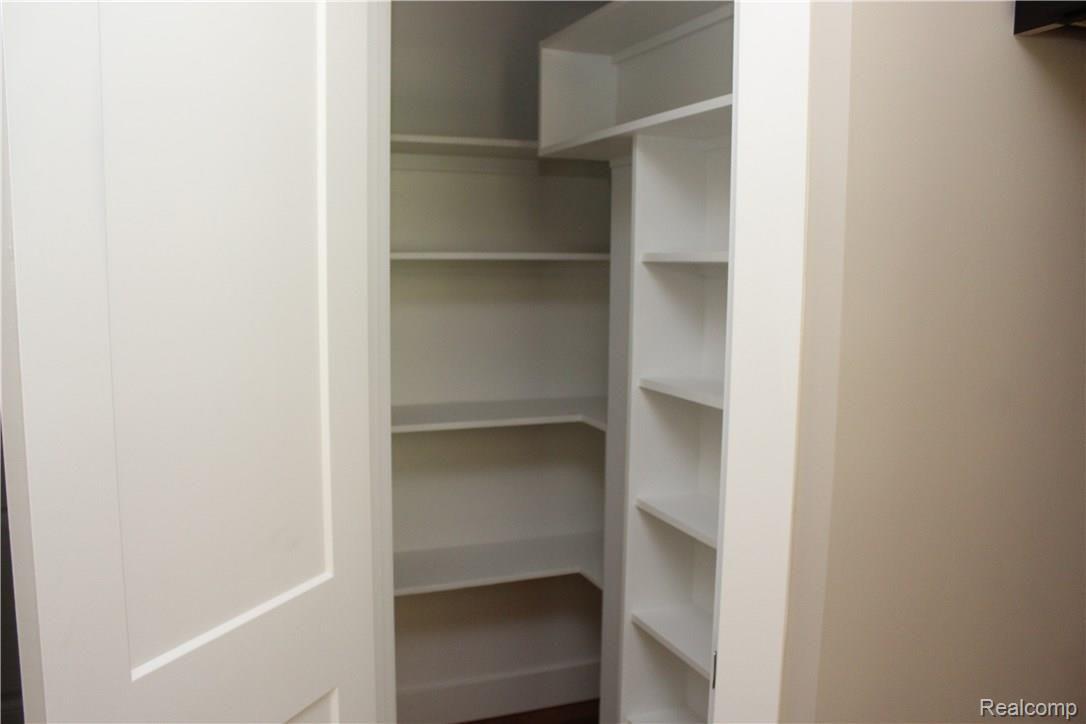 317 Triangle Lake Road Howell, MI 48843 - Photo 53 of 73 Walk-in Pantry Standard with Custom Built-In Shelves, NO WIRE SHELVING IN VETTRAINO HOMES!