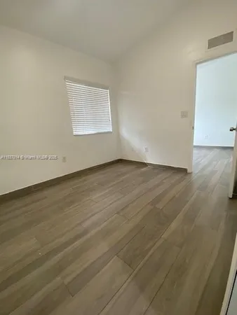 a view of a room with racks on the wall