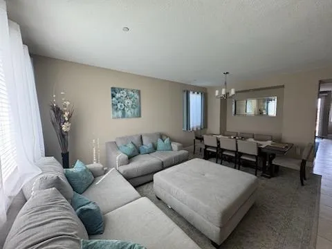 a living room with furniture and a couch