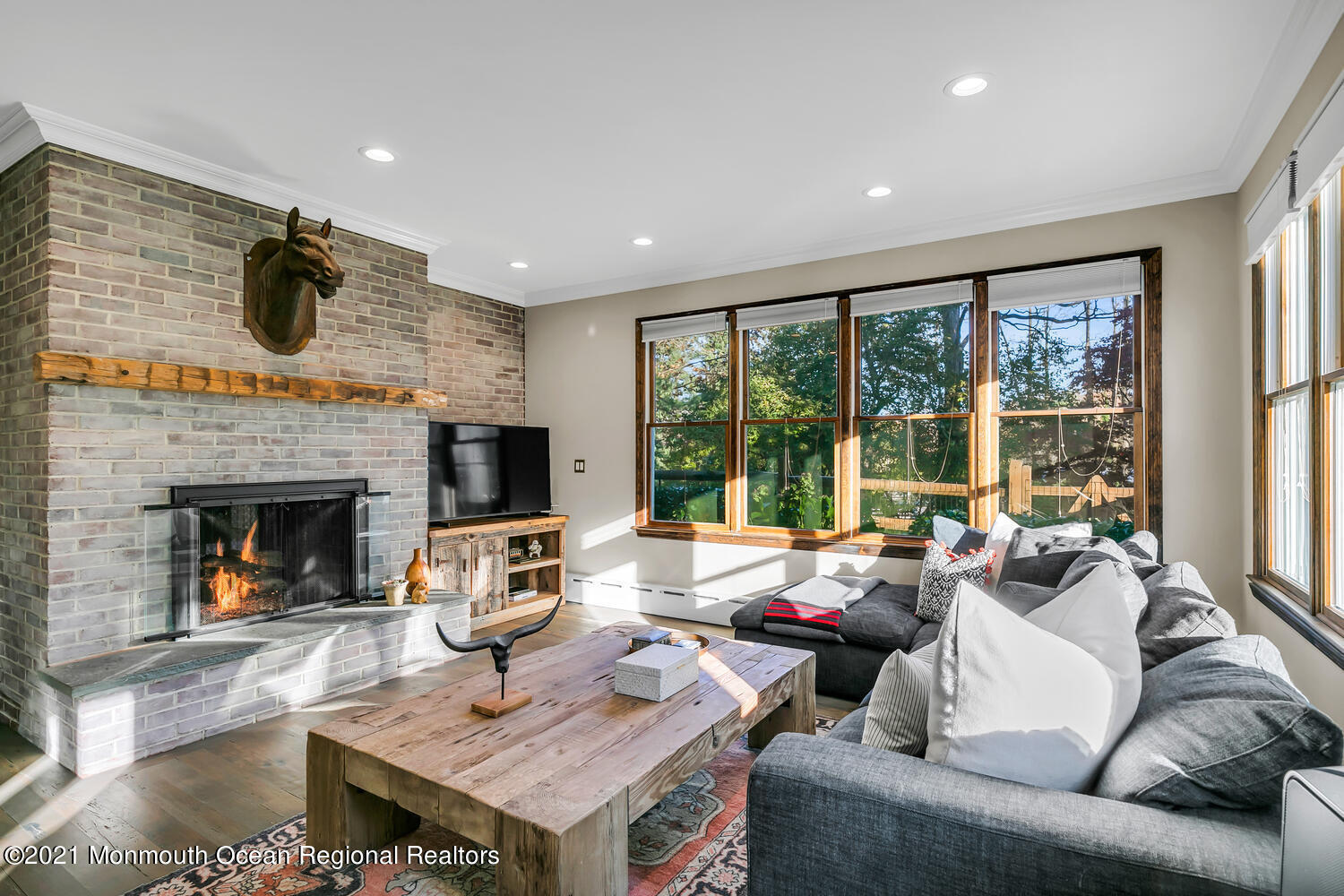 122 Browns Dock Road Middletown, NJ 07716 - Photo 11 of 54 a living room with furniture fireplace and flat screen tv