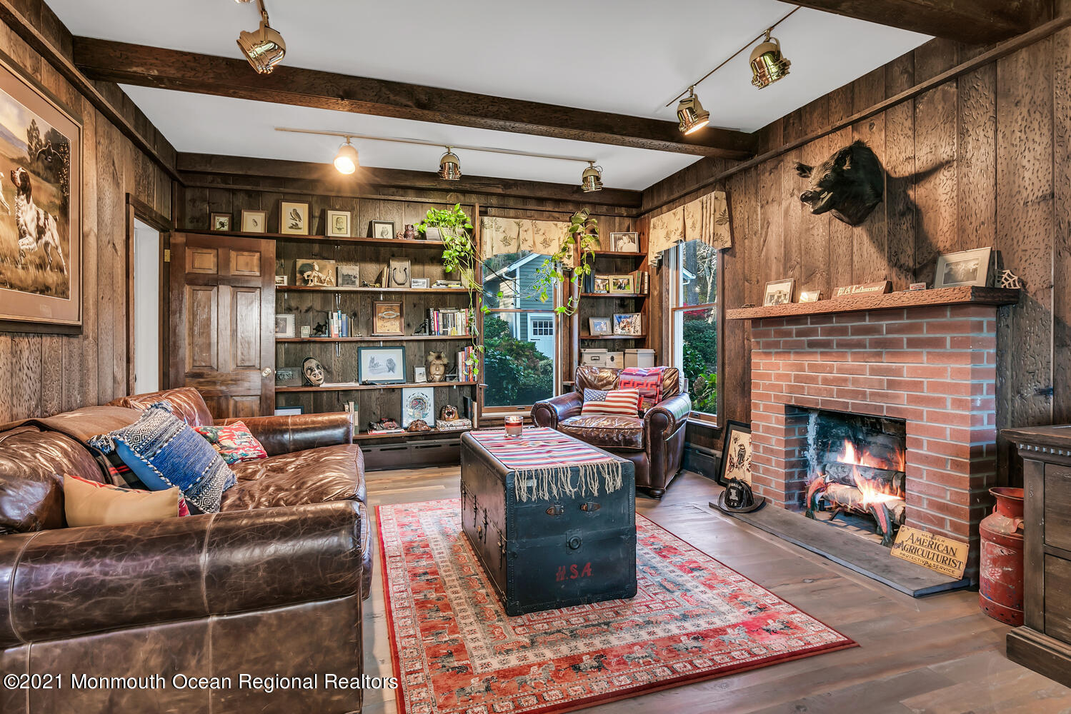 122 Browns Dock Road Middletown, NJ 07716 - Photo 17 of 54 a living room with furniture a fireplace and a table