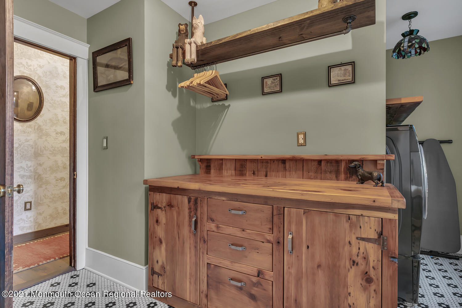 122 Browns Dock Road Middletown, NJ 07716 - Photo 31 of 54 a room with a sink and a mirror