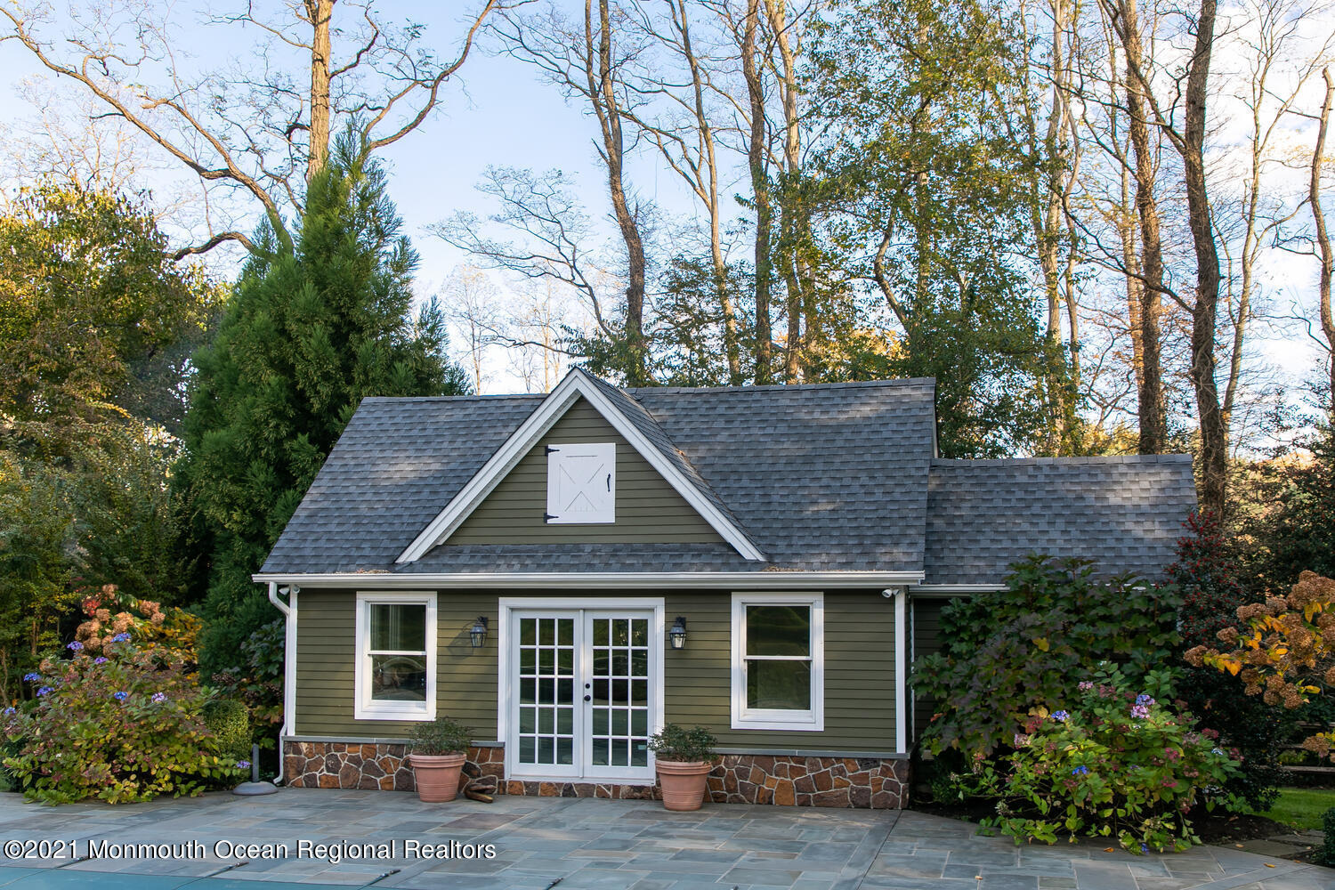 122 Browns Dock Road Middletown, NJ 07716 - Photo 38 of 54 a front view of a house with a garden