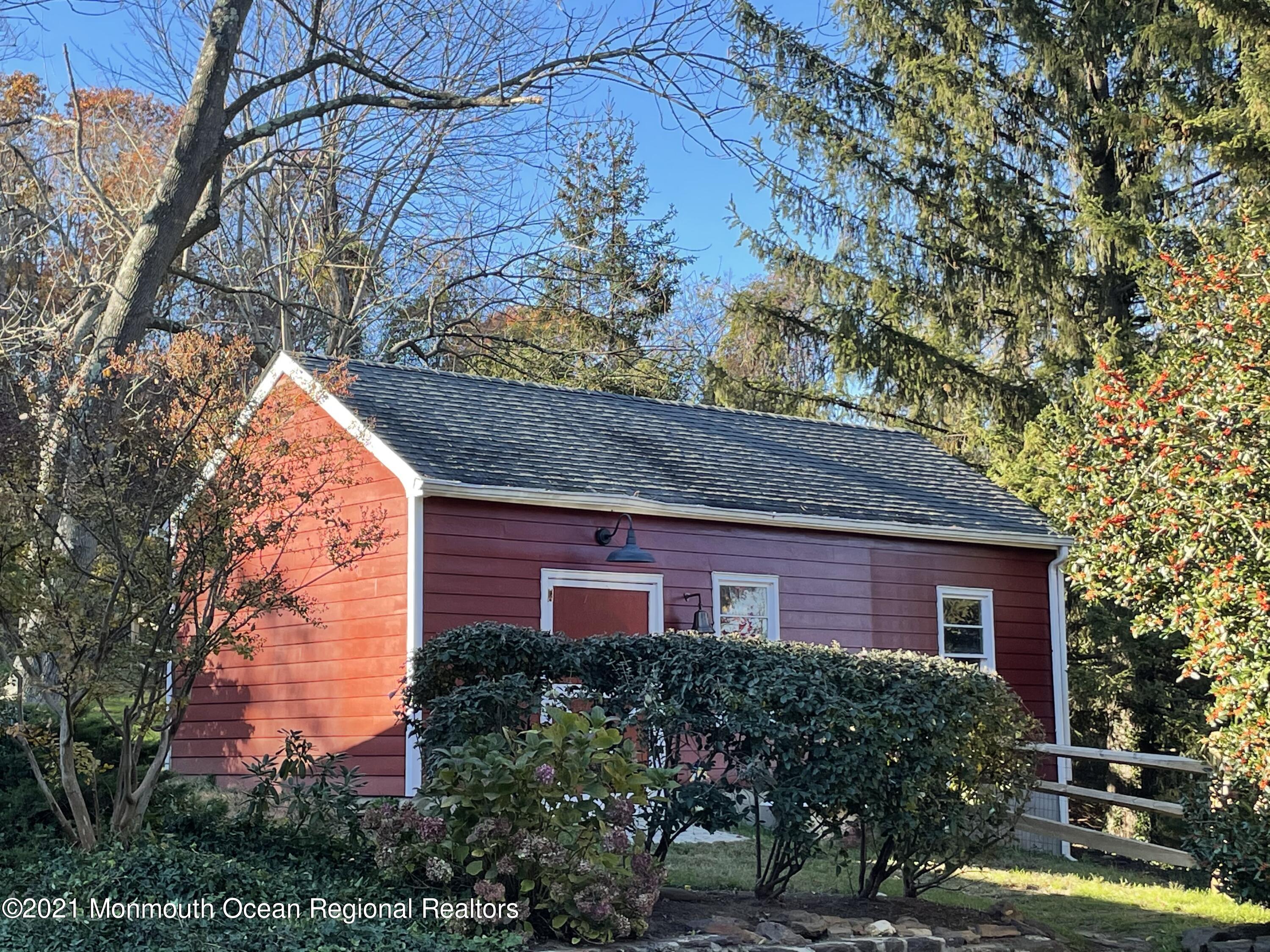 122 Browns Dock Road Middletown, NJ 07716 - Photo 50 of 54 a view of a house with a yard