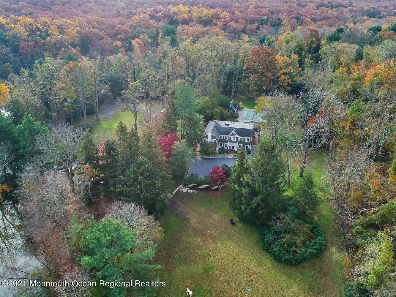 122 Browns Dock Road Middletown, NJ 07716 - Photo 52 of 54 an aerial view of residential house with outdoor space and trees around