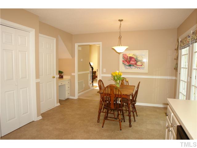 5124 Fairmead Circle Raleigh, NC 27613 - Photo 9 of 19 a dining room with furniture and window