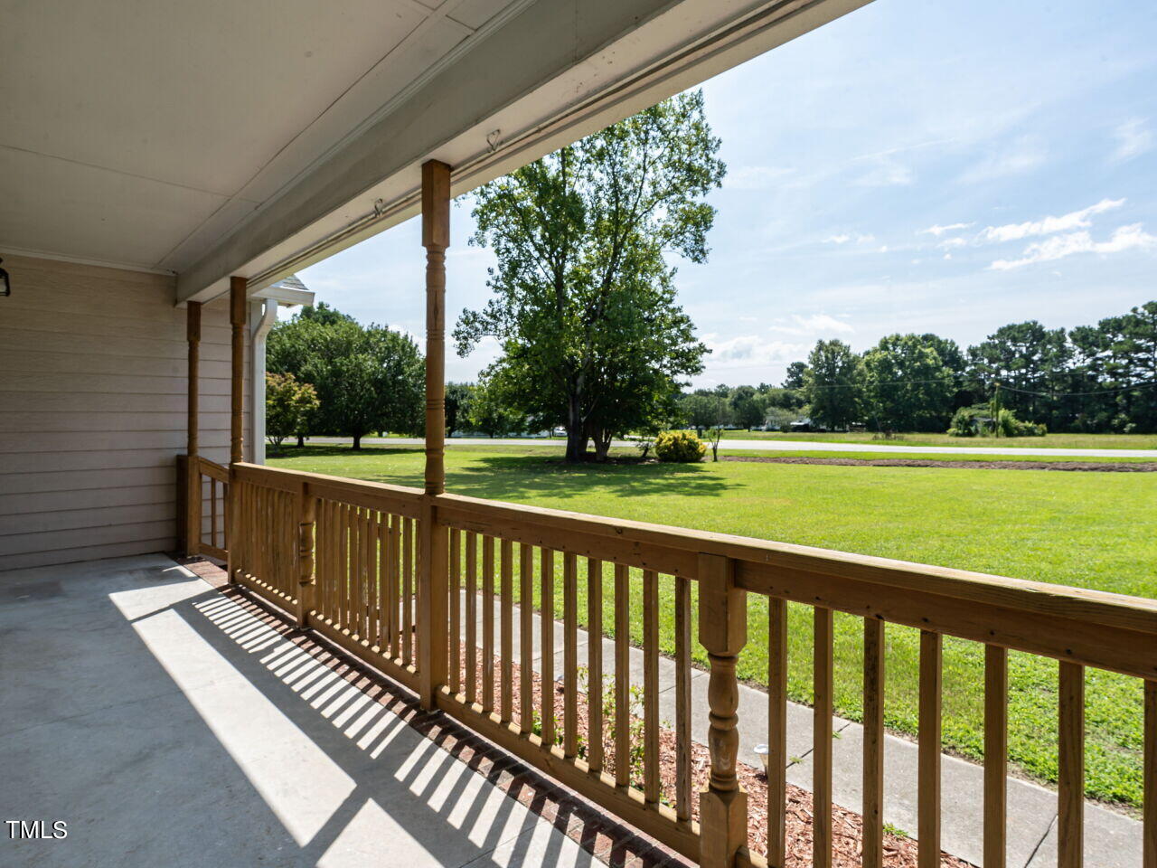 597 Thorne Road Selma, NC 27576 - Photo 5 of 28 004-1280x960-front-porch-view - Copy