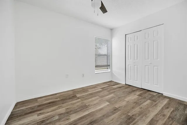 a kitchen with stainless steel appliances granite countertop a refrigerator a stove top oven a sink and dishwasher