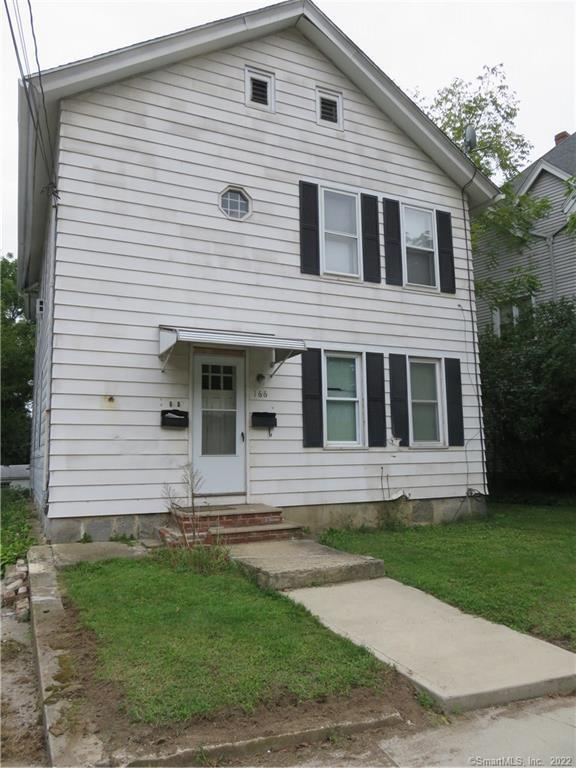 166 Woodtick Road Waterbury, CT 06705 - Photo 1 of 1 a front view of a house with a yard
