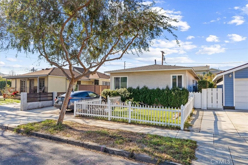 3443 Sherbourne Drive Culver City, CA 90232 - Photo 1 of 21 a front view of a house with a small yard and plants