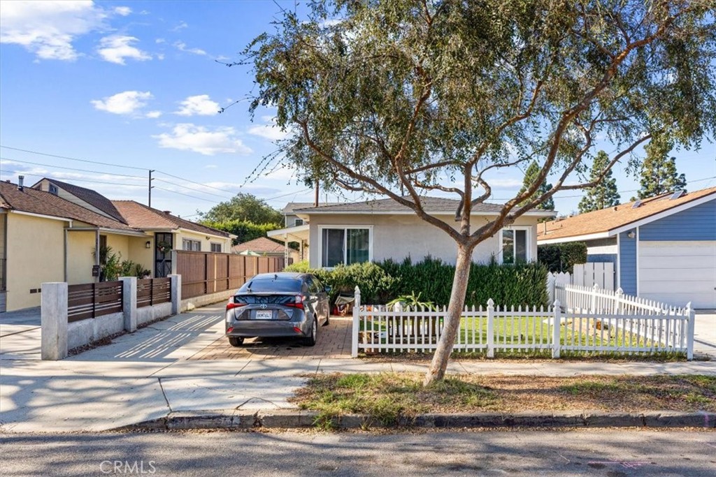 3443 Sherbourne Drive Culver City, CA 90232 - Photo 2 of 21 a front view of a house with a garden