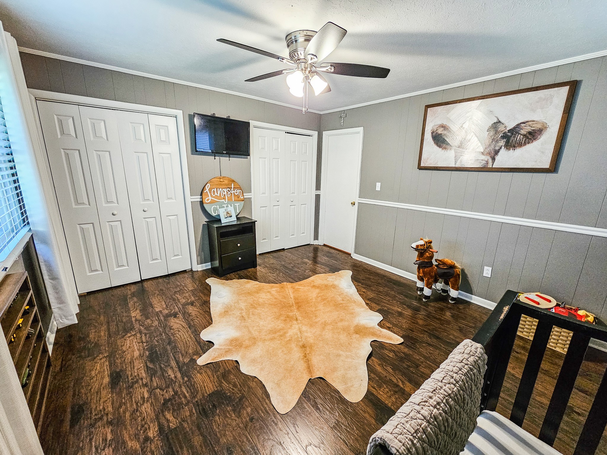 300 Longview Drive Pulaski, TN 38478 - Photo 19 of 35 a living room with furniture and a chandelier