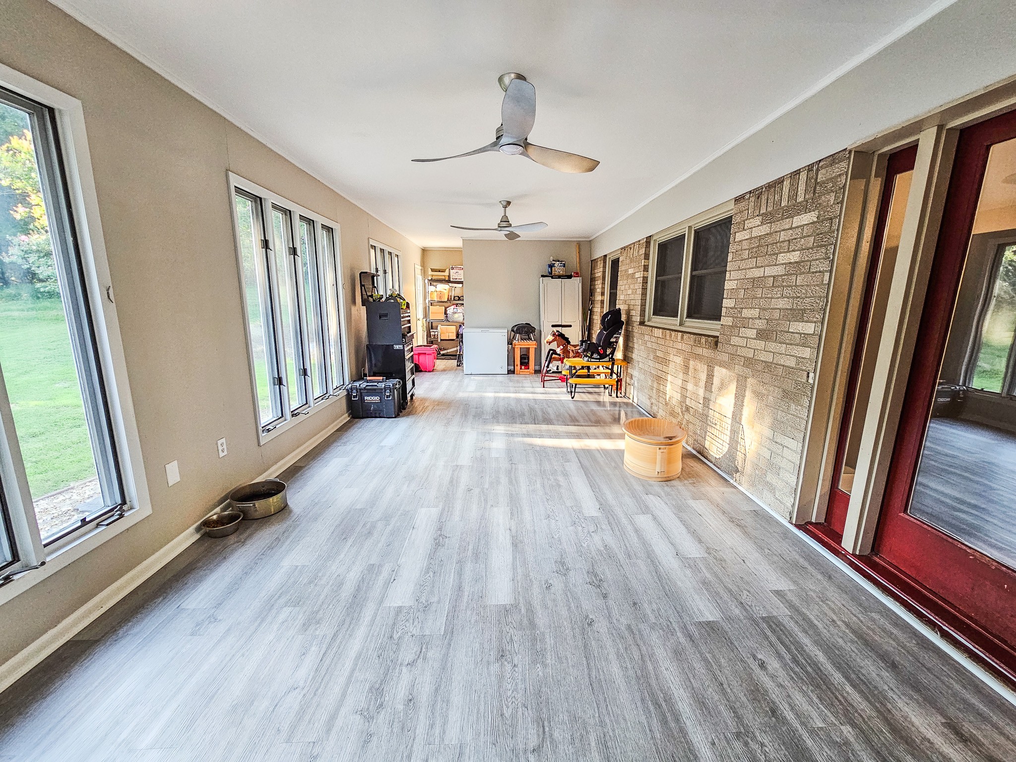 300 Longview Drive Pulaski, TN 38478 - Photo 27 of 35 a view of a livingroom with furniture hardwood floor and a ceiling fan