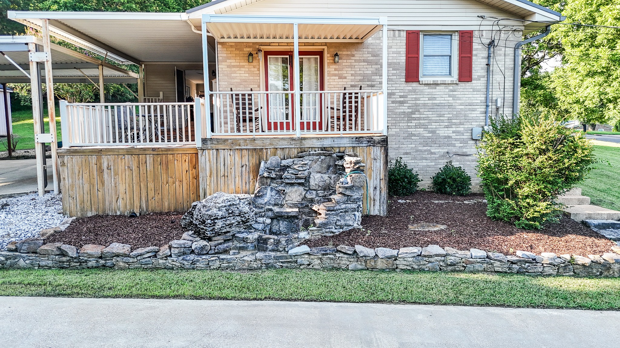 300 Longview Drive Pulaski, TN 38478 - Photo 34 of 35 a front view of a house with a garden