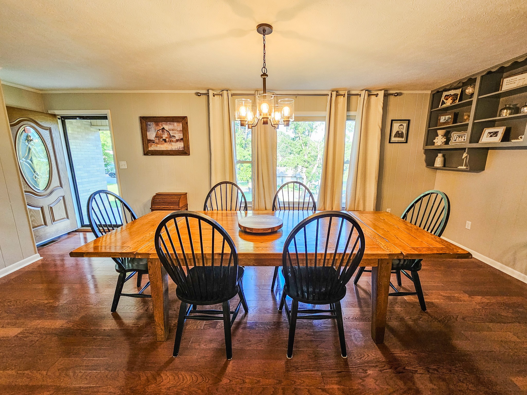 300 Longview Drive Pulaski, TN 38478 - Photo 7 of 35 a dining room with furniture a chandelier and wooden floor