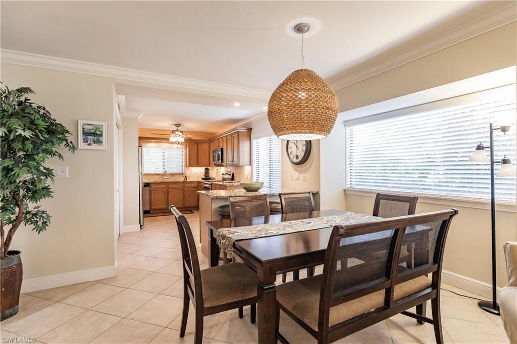 910 Vanderbilt Beach Road, Unit 311W Naples, FL 34108 - Photo 10 of 31 a view of a dining room and livingroom