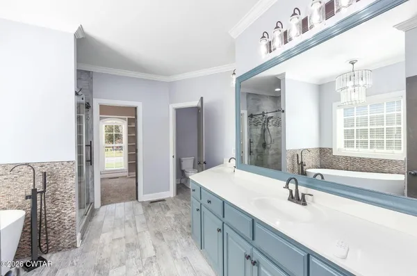 a bathroom with a sink and a bathtub