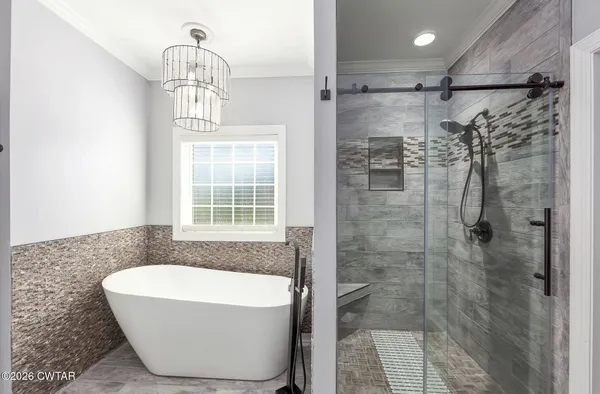 a bathroom with a toilet a sink and a mirror