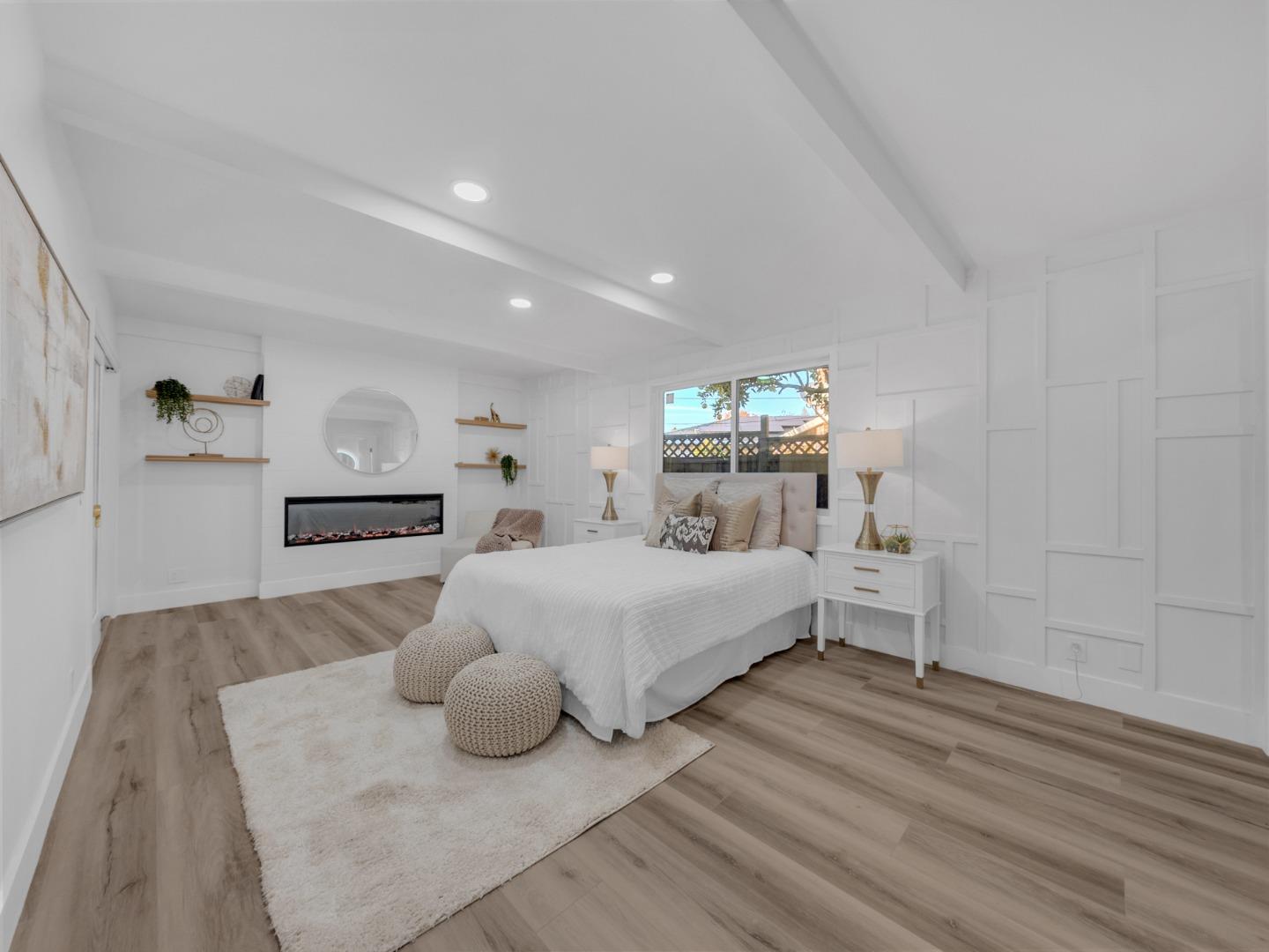 2303 Gunar Drive San Jose, CA 95124 - Photo 19 of 42 a spacious bedroom with a bed and window