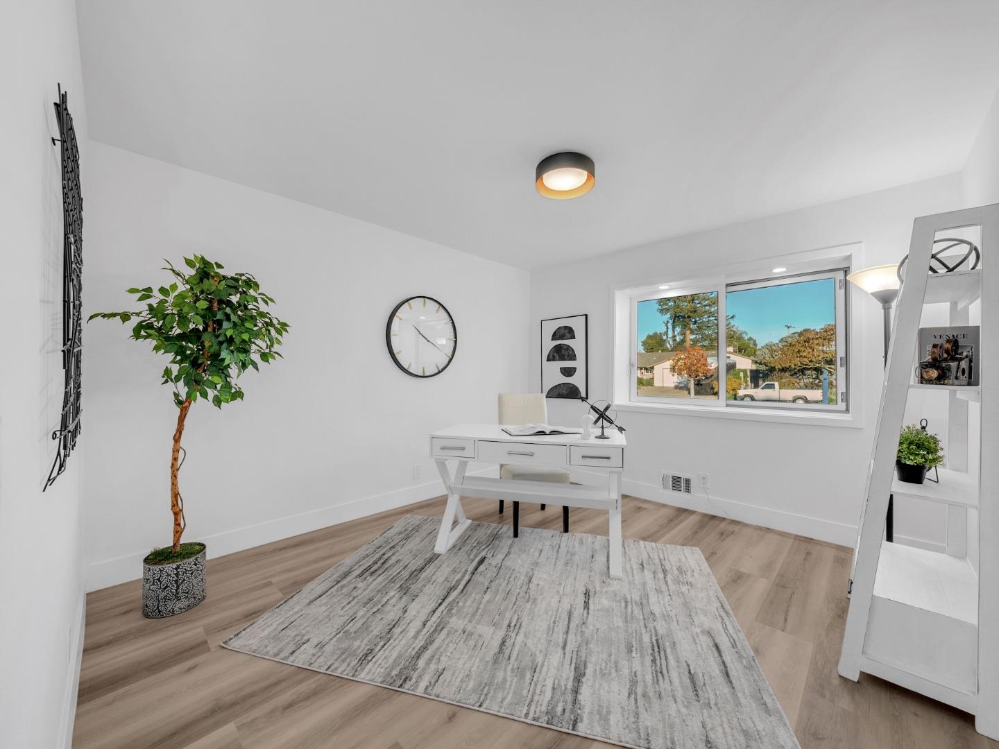 2303 Gunar Drive San Jose, CA 95124 - Photo 24 of 42 a view of a room with furniture and wooden floor