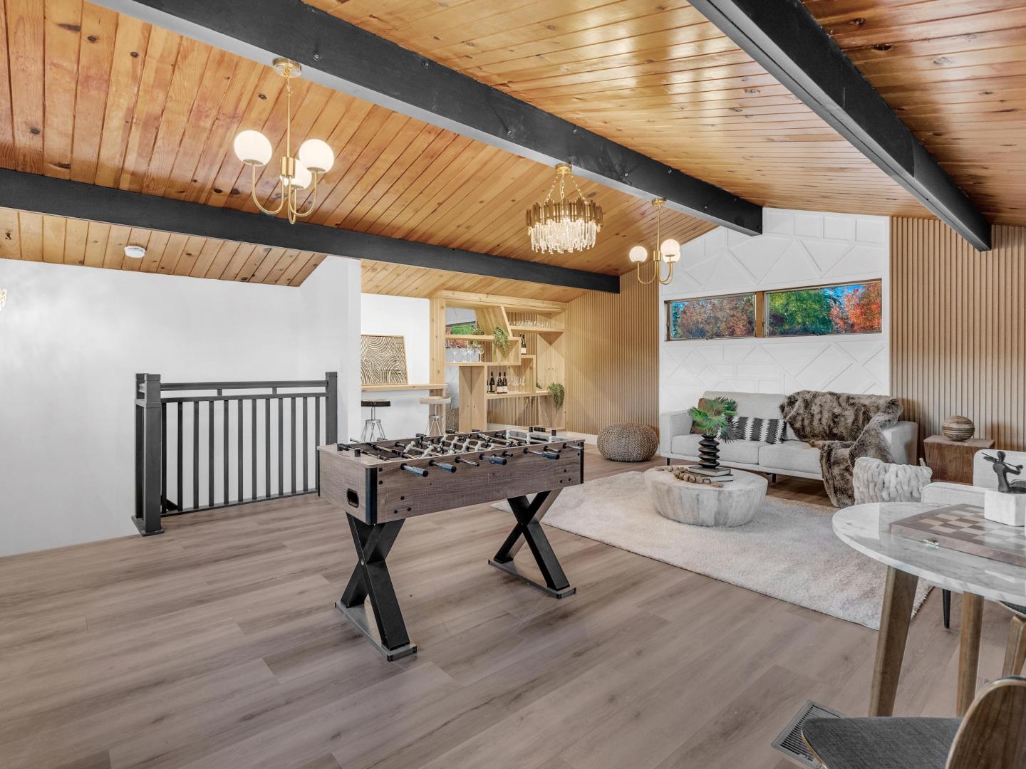2303 Gunar Drive San Jose, CA 95124 - Photo 27 of 42 a living room with furniture and wooden floor
