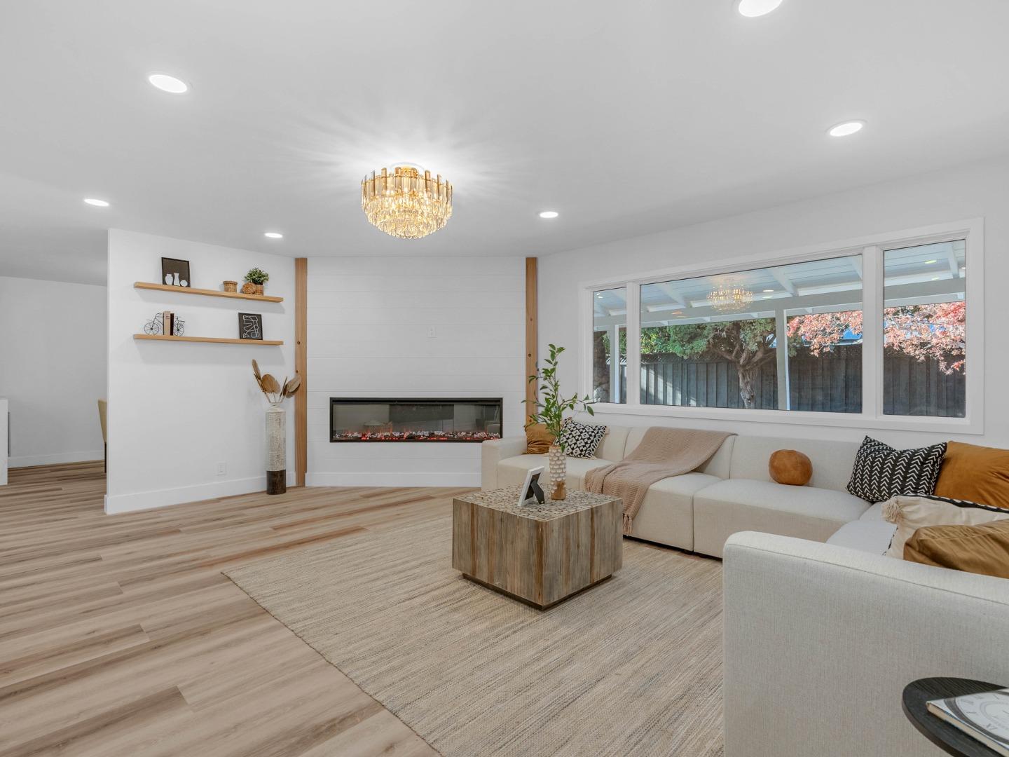 2303 Gunar Drive San Jose, CA 95124 - Photo 4 of 42 a living room with furniture and a large window
