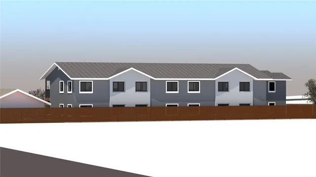 a view of house with yard