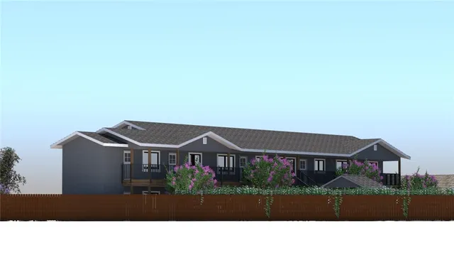 a black and white photo of a house